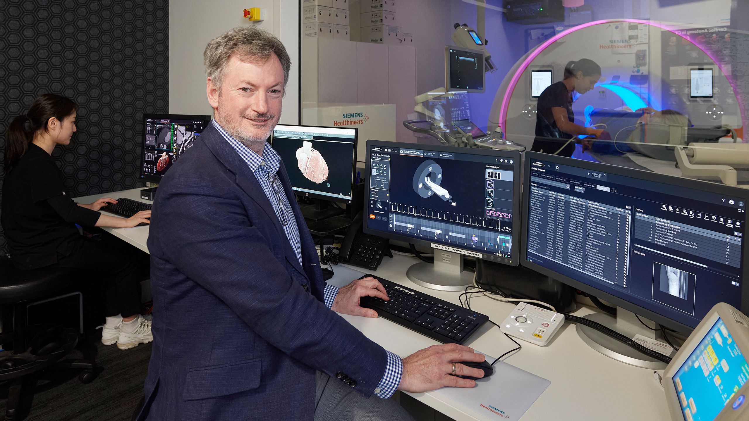 Radiologist, Dr Conor Murray at the office desk of the scan theatre at his clinic, ChestRad.